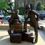 Statue of two Fathers of the Confederation continuing debate on the street in Charlottetown, the birthplace of the Confederation