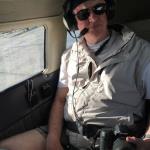 Edgar on back seat of Piper Lance