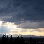 Thunderstorms crossing the path of the Alaskan range in the late evening