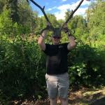 Sam dons caribou antlers