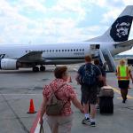 Boarding the 737 Combi by rear stairs (handicapped were lifted on platform to Sky Chef door on the other side)