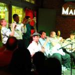 Tucker Middle School jazz band students join jazz band at Maison jazz club in French Quarter, April 2, 2015
