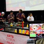 Tucker HS RoboTigers team 1320D at fieldside for qualifying match