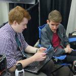 Collin and Nick work in the pits at VEX World Championships in Lexington, KY