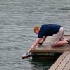 Sam launches RC powerboat from Gignilliats' dock