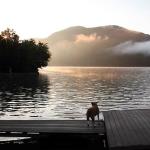 Molly watches for sunrise from the floating dock