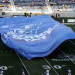 Giant GSU banner precedes pregame field entrance of GSU Band