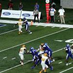 Diondre Champaigne heads for back of end zone as Dan Ellington's pass floats his way