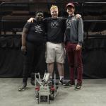 Our boys, their robot, and their trophy