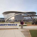 Sam in front of new Mori Hosseini Student Union on the Daytona Beach campus of Embry-Riddle Aeronautical University