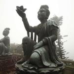 Two of 6 "devas" offering gifts to Giantg Buddha
