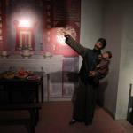 Shezhen Museum display of boy celebrating first birthday in traditional way