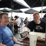 Sam and Julia enjoying Steak Shack hamburgers on terrace of IFC Mall