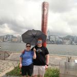 Sam and Julia in front of monument commemorating 2005 Beijing Olympics for which Hong Kong hosted the equestrian events, monument in the shape of the Olympic torch