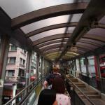 Central Mid-Levels Escalators, world's largest outdoor escalator system provides easier access to crossing streets in steep part of Hong Kong Island, approximately half mile long series of escalators