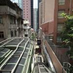 Central Mid-Levels Escalators, world's largest outdoor escalator system provides easier access to crossing streets in steep part of Hong Kong Island, approximately half mile long series of escalators