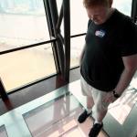 Sam and the glass floor at Macau Tower