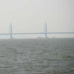 Fifty-five kilometer Zhuhai-Macau-Hong Kong Bridge opened in 2018 at cost of 18 billion US$ is the longest ocean crossing bridge in the world