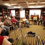 Birthday party crowd in the library at Atria Park of Tucker