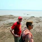 Julia and Sam survey the soon to be inundated ocean floor at Hopewell Rocks