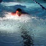 Sam swims 50 fly late in the night