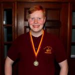 Sam wears his Top 10% medallion, May 7, 2015
