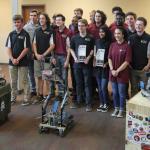Tucker HS robotics teams with Chamblee Charter HS robotics team that teamed with Tucker HS to win the Engineering Division at the 2019 World Championships and finish 6th in the world