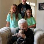 Barley gets love from Grandmother Burke as Sam and his cousins Blain and Caroline Caldwell look on