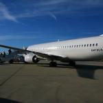 The unmarked 737 used to transport the Georgia State football team to Austin, Texas for the Texas State football game in San Marcos, Texas