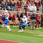 Penny Hart fights for extra yardage after catch and run in the red zone, November 14, 2015