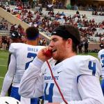 Georgia State quarterback Nick Arbuckle talks to the assistant coaches in the press box after Georgia State's first touchdown against Texas State, November 14, 2015