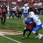 Tarris Batiste tackles a Texas State player for a short gain, November 14, 2015