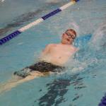 Sam swims backstroke in 4X50 medley relay at Chamblee-Padeia-Tucker swim meet, November 3, 2016