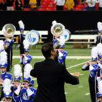 Band Director Chester Phillips conducts GSU Marching Band during pre-game program