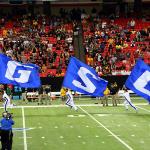 GSU cheerleaders lead team on field before game