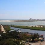 View across Ponce Inlet toward New Smyrna Beach as seen from observation platform of Ponce Inlet Lighthouse