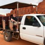 Sam in open air tour vehicle used by Majestic Monument Valley Tours