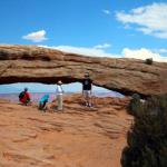 Sam standing in front of Mesa Arch in Island in the Sky section of Canyonlands NP near Moab